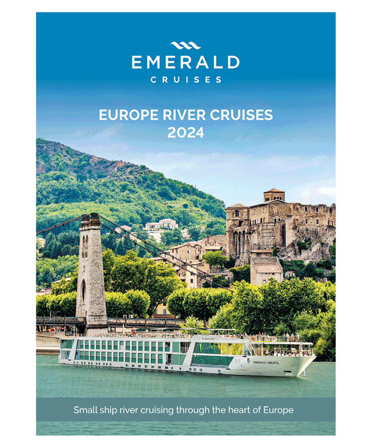 A luxury river cruise brochure, featuring a ship sailing past a hilly region, near a town with Medieval-style buildings
