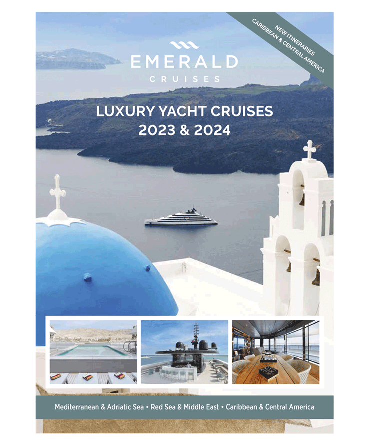 A luxury yacht cruise brochure cover, featuring a yacht sailing the seas of Santorini in front of the blue-domed church